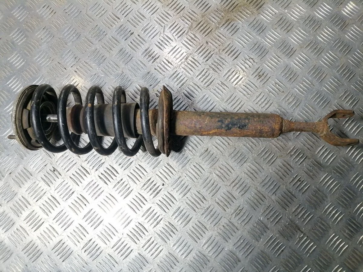 Стойка амортизатора передняя VW Passat B5