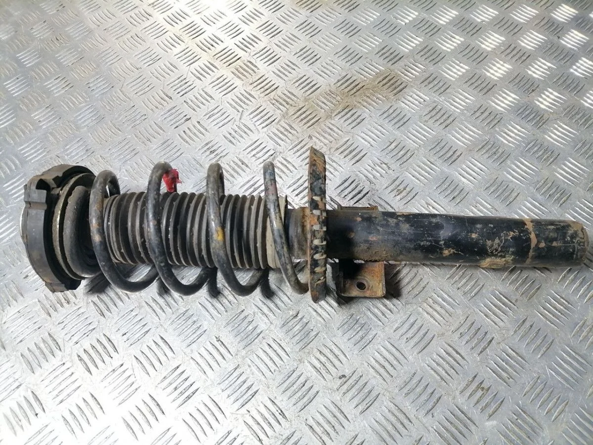 Стойка амортизатора передняя Skoda Fabia