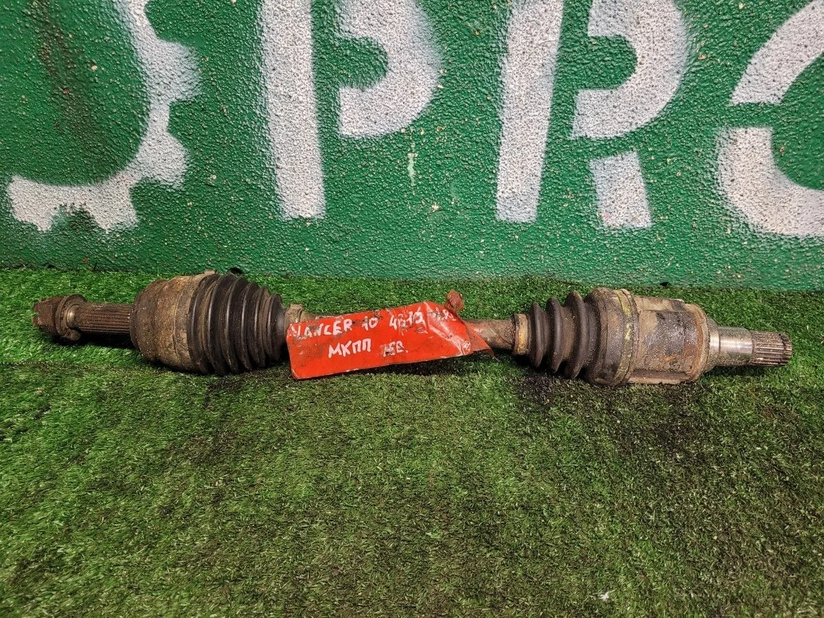 Полуось в сборе левая на Lancer 10 4B10