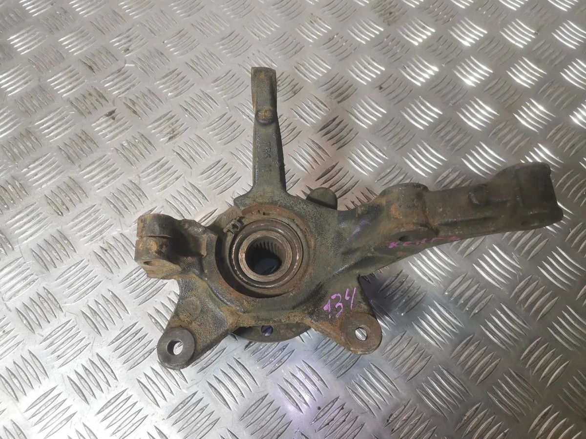 Поворотный кулак передний левый Renault Kangoo