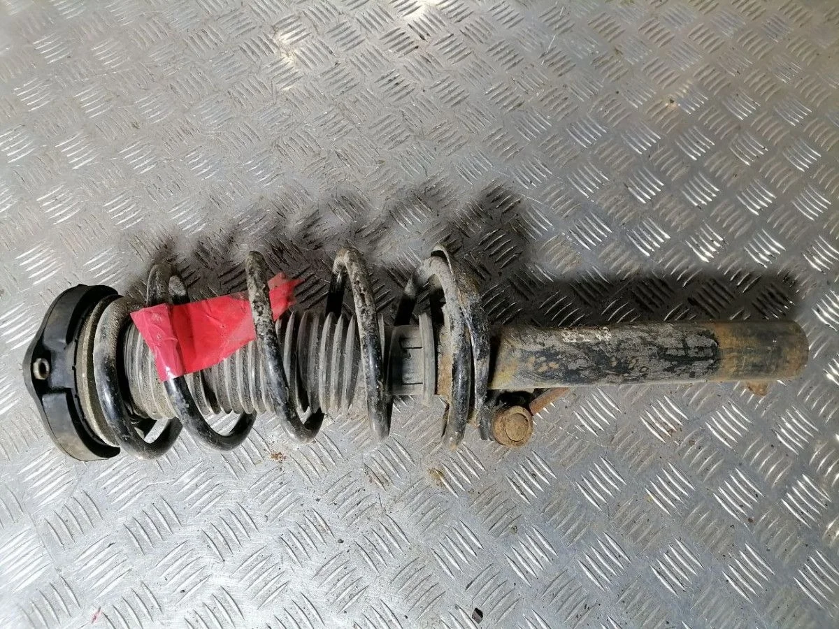 Стойка амортизатора передняя VW Jetta VI