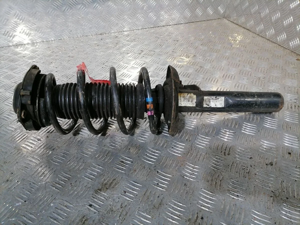 Стойка амортизатора передняя VW Golf IV