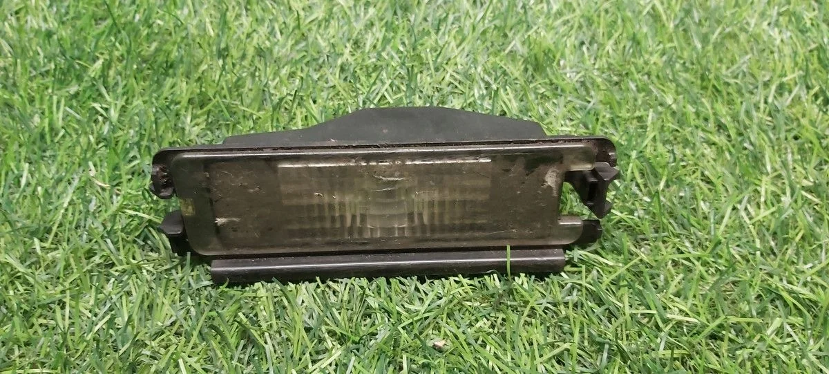 Фонарь номерного знака Renault Logan sandero