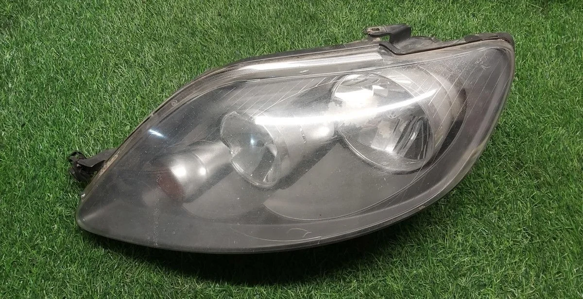 Фара левая Volkswagen Golf Plus