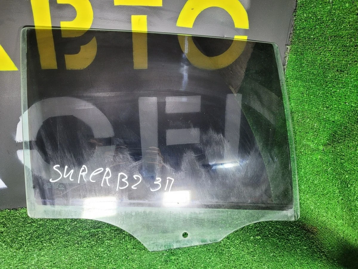 Стекло двери задней правой на Skoda SuperB 2