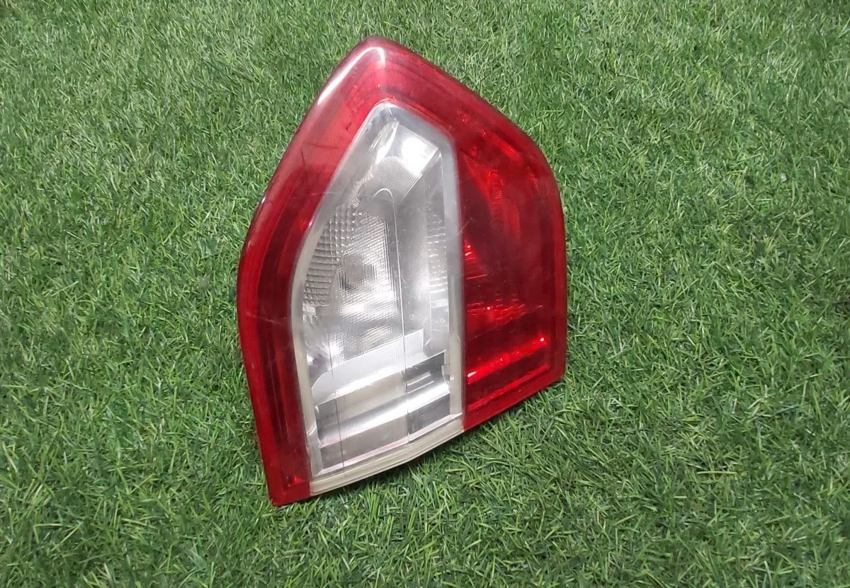 Фонарь на крышку багажника задний левый Renault