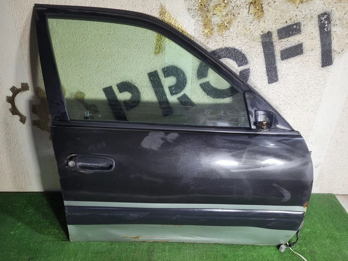 Дверь передняя правая на Carib E110