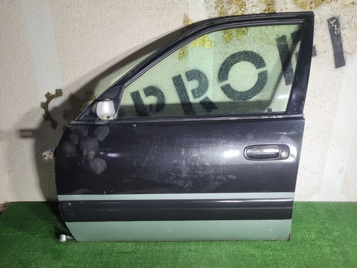 Дверь передняя левая на Carib E110