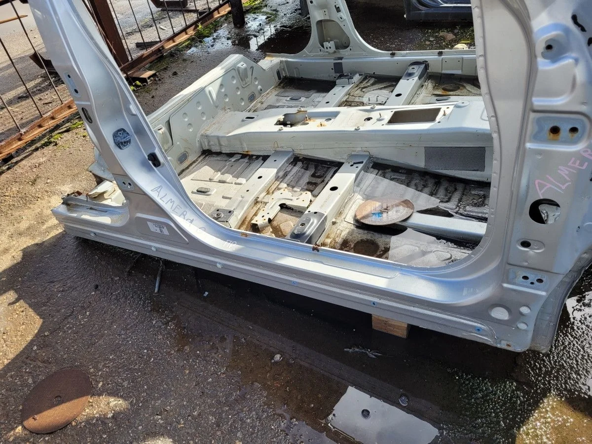 Порог правый со стойкой на Nissan Almera G15