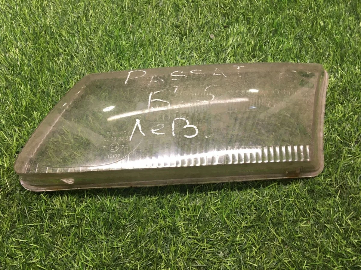 Стёкла левой фары Volkswagen Passat B5