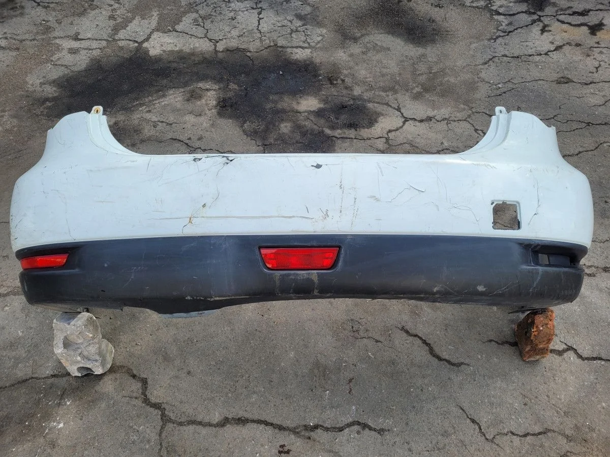 Бампер задний на Nissan Almera G15