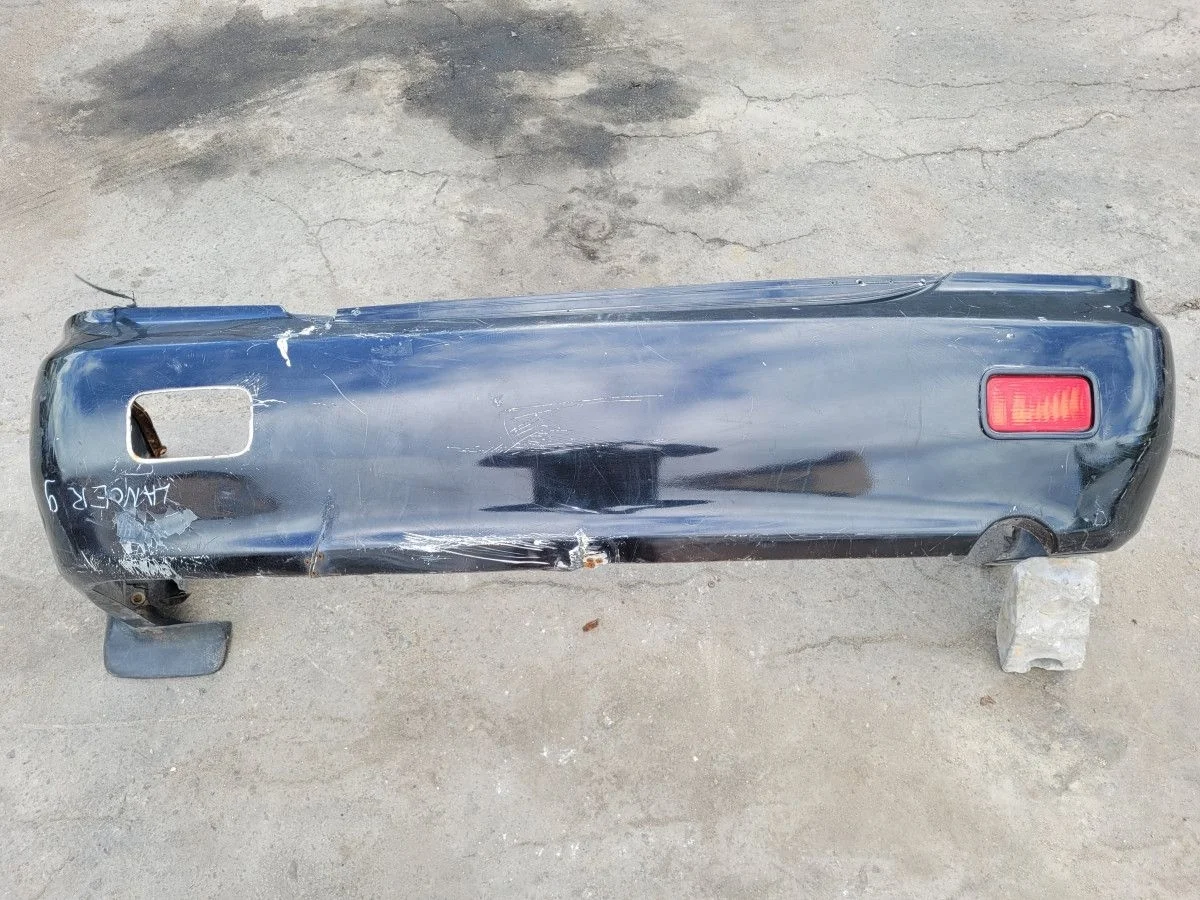 Бампер задний на Mitsubishi Lancer 9