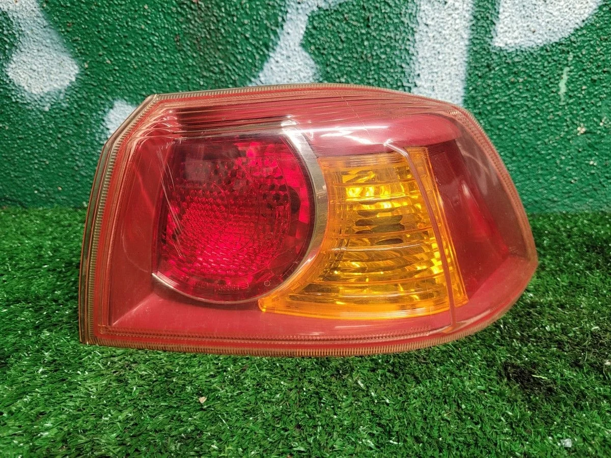 Фонарь задний наружный правый Mitsubishi Lancer X