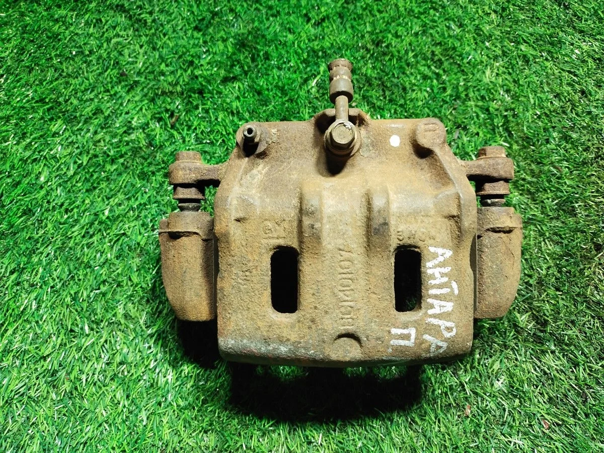 Суппорт передний левый Opel Antara