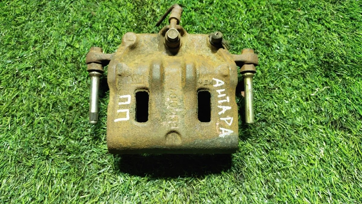 Суппорт передний левый Opel Antara