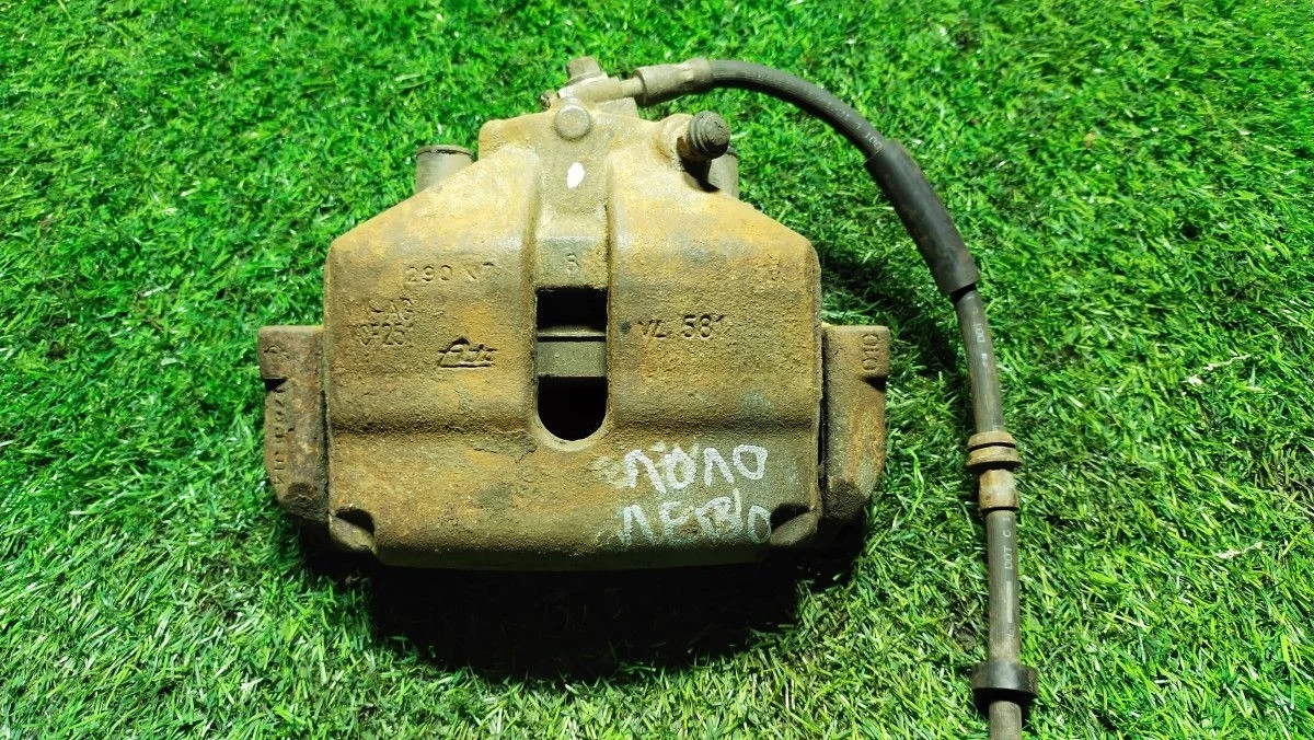 Суппорт передний левый Volkswagen Polo