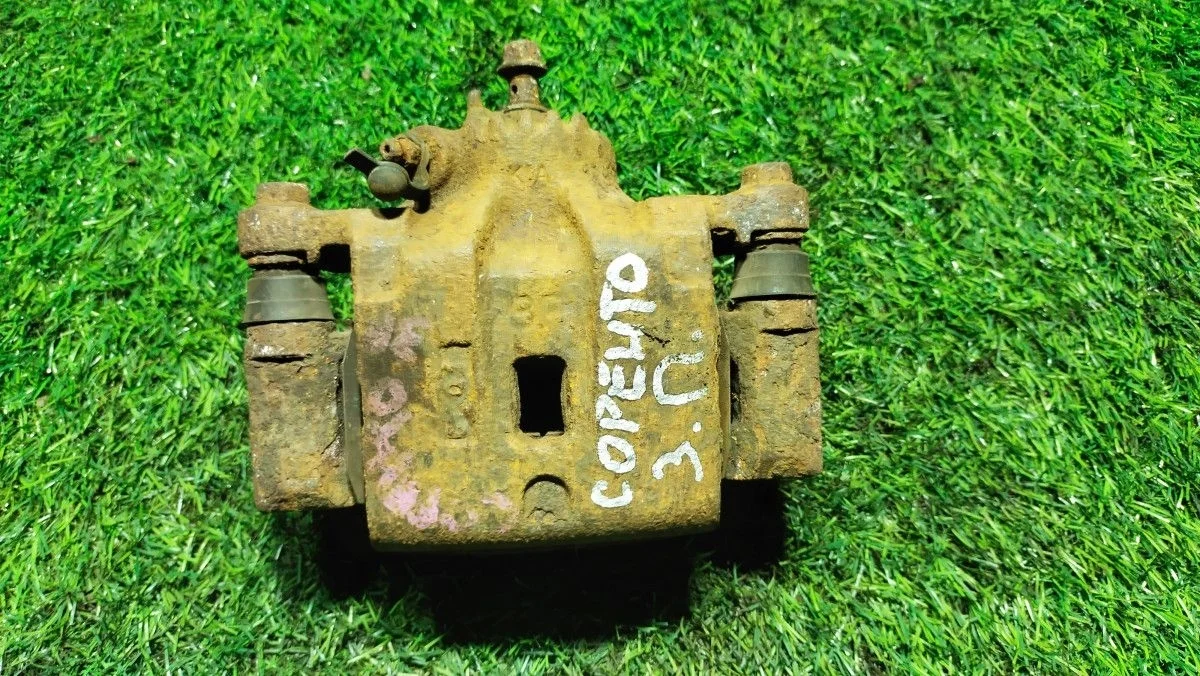 Суппорт тормозной правый задний Kia Sorento