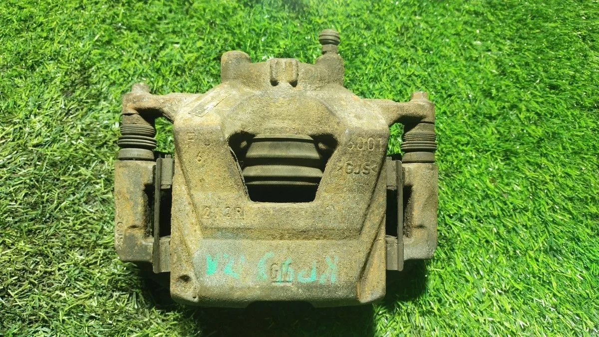 Суппорт тормозной Chevrolet Cruze (J300) I