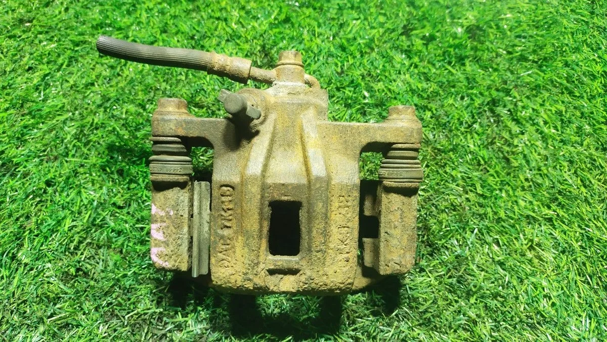 Суппорт тормозной задний левый  Chevrolet Lacetti