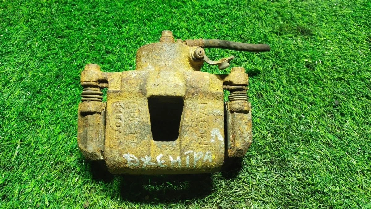 Суппорт передний левый Daewoo Gentra