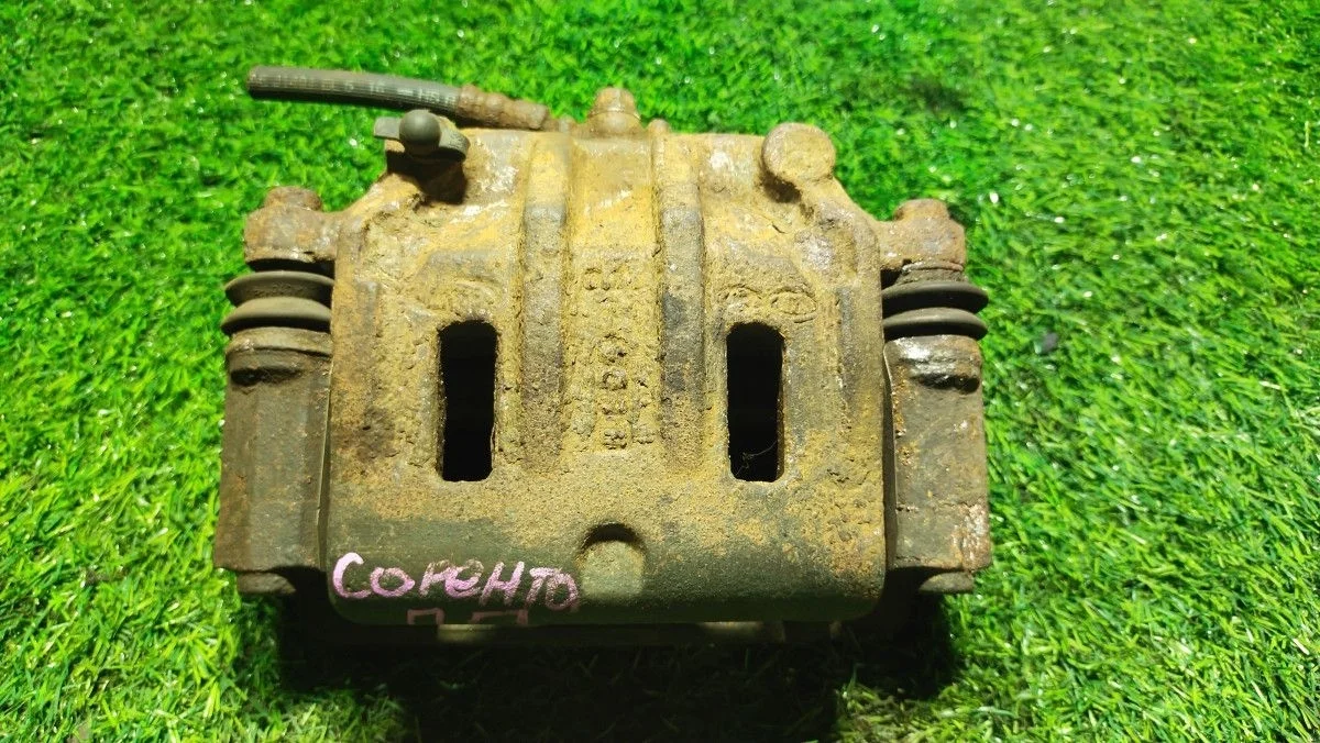 Суппорт тормозной передний правый Kia Sorento