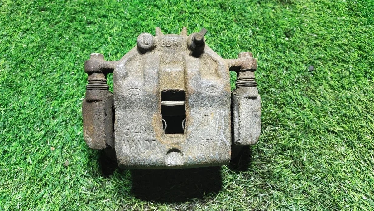 Суппорт передний левый Kia Rio X-Line