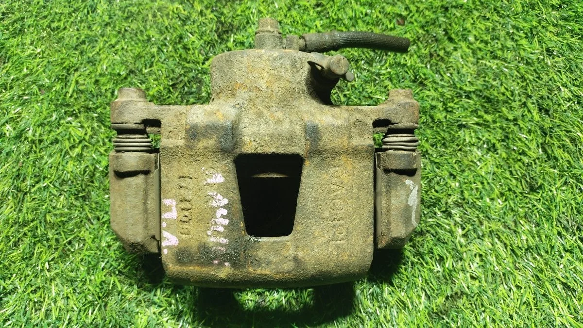 Суппорт тормозной передний левый Chevrolet Lacetti