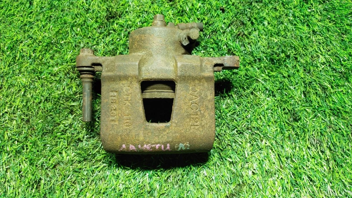 Суппорт тормозной передний левый Chevrolet Lacetti