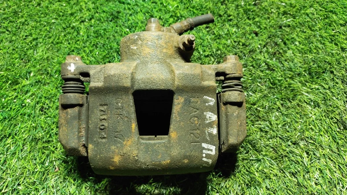 Суппорт тормозной передний левый Chevrolet Lacetti