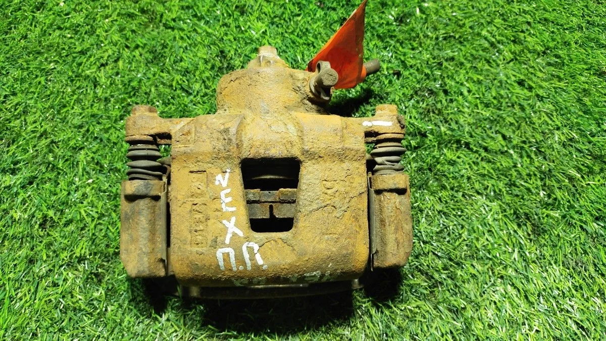 Суппорт передний левый Daewoo Nexia