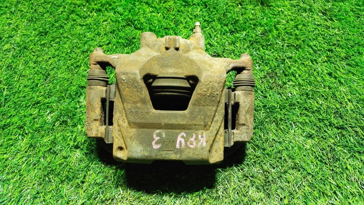 Суппорт тормозной передний левый  Chevrolet Cruze