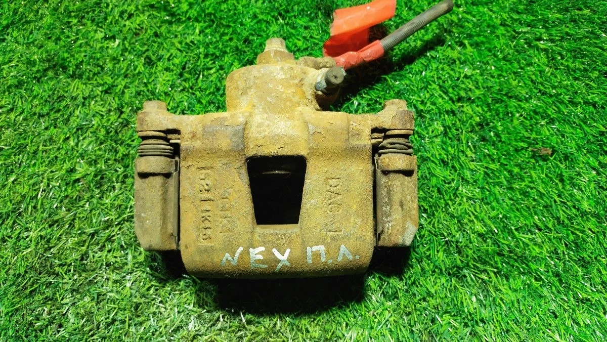 Суппорт передний левый Daewoo Nexia