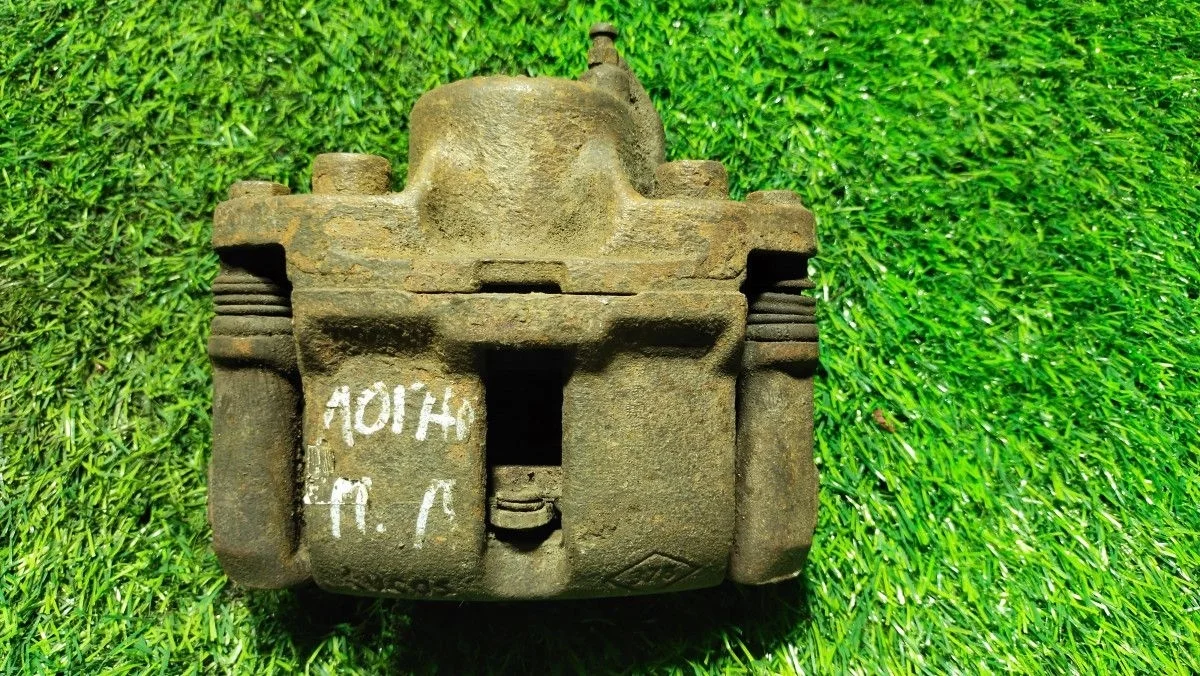 Суппорт передний левый RENAULT Logan