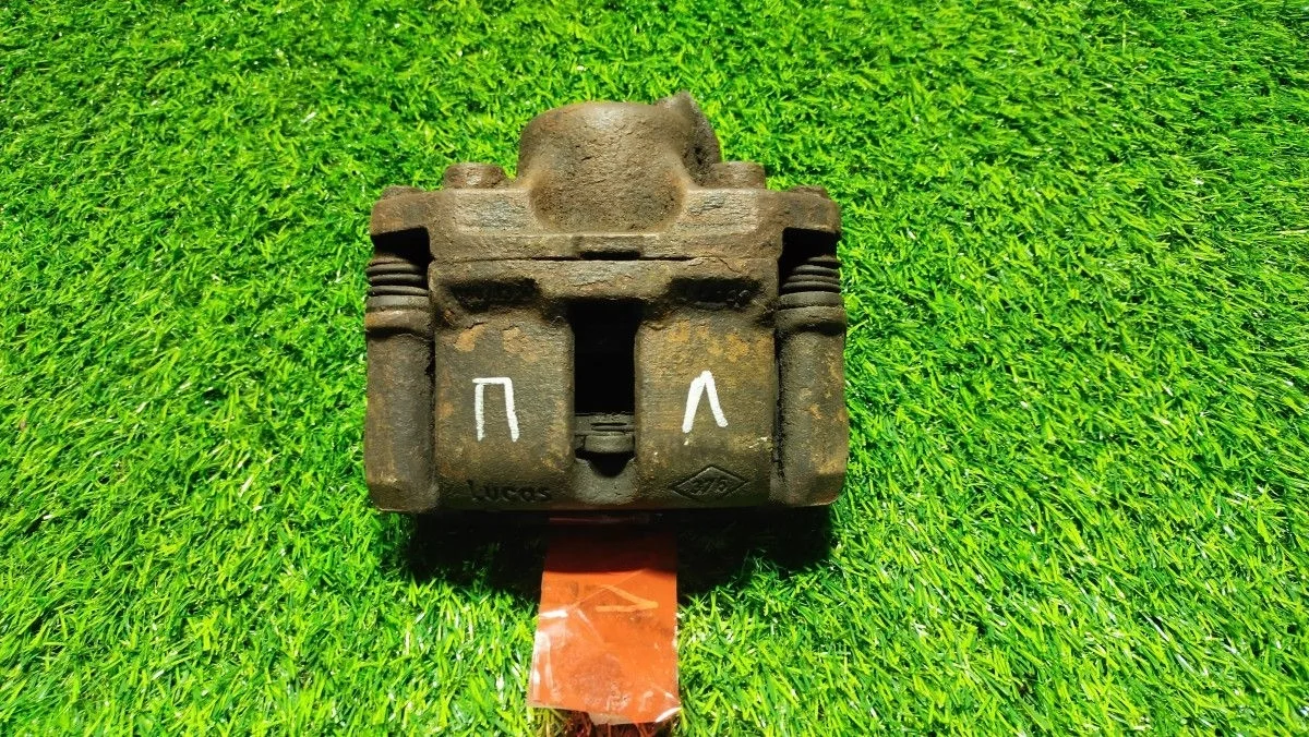 Суппорт передний левый RENAULT Logan