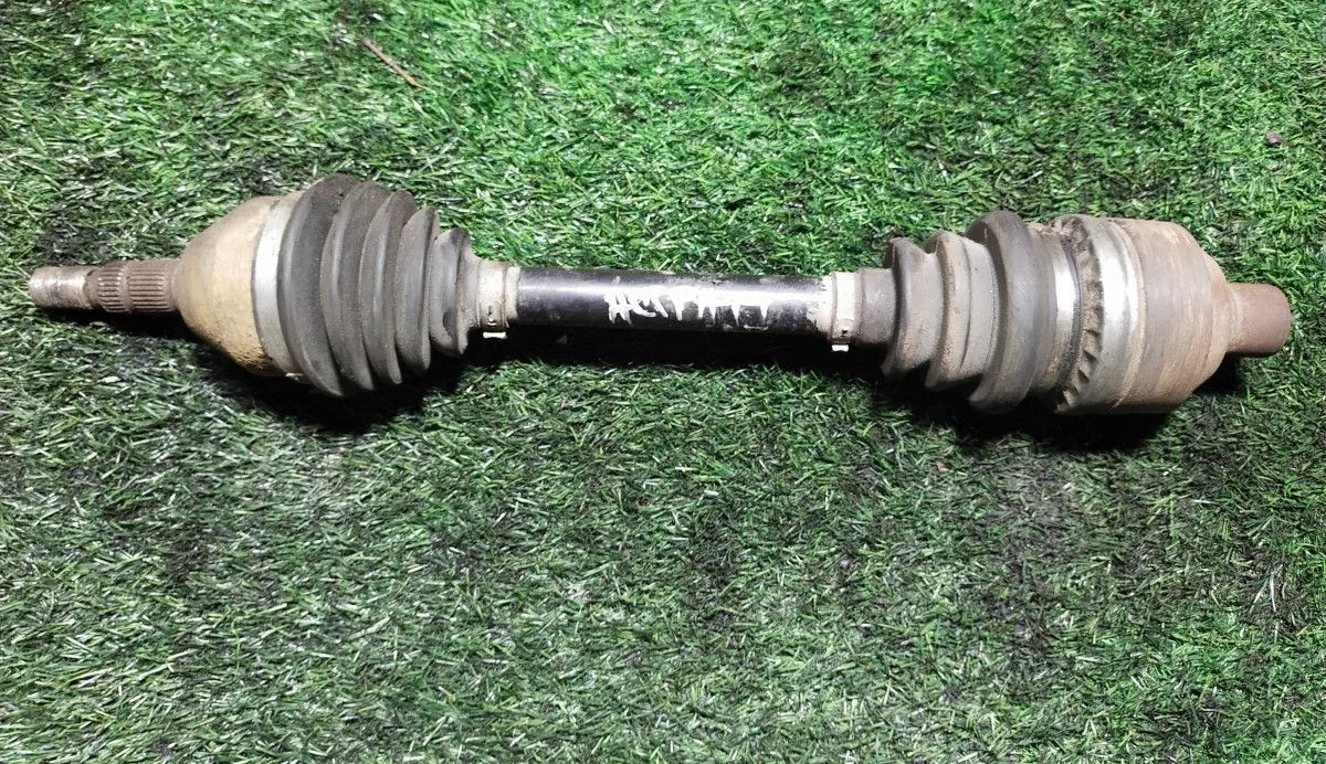 Полуось привода Opel Astra H передний левый