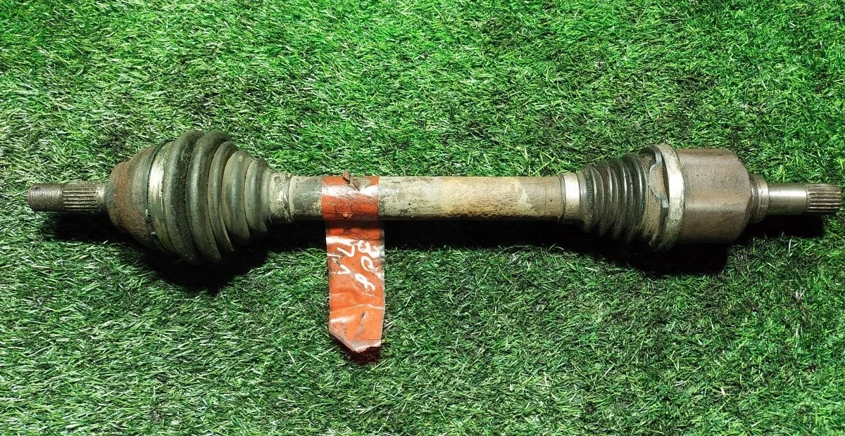 Полуось левая передняя Peugeot 308