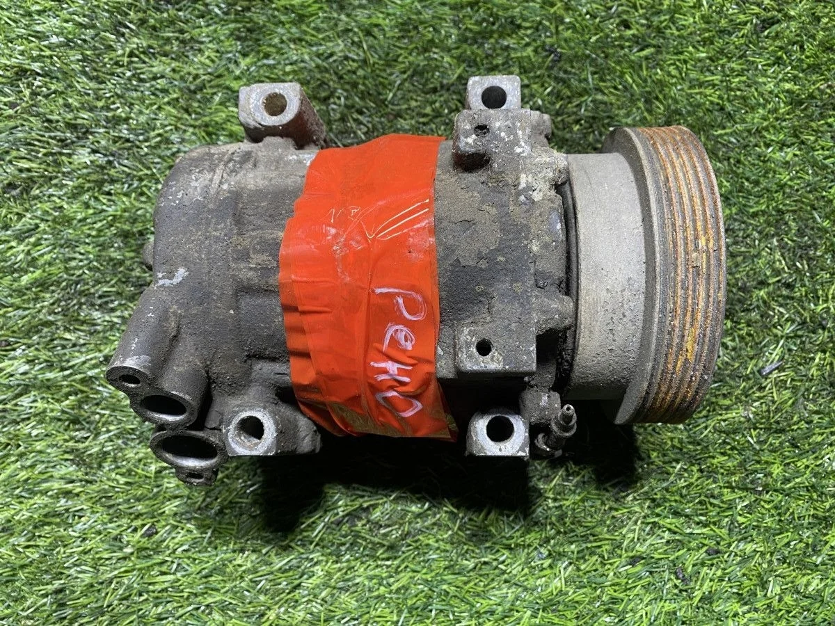 Компрессор кондиционера Renault Logan.