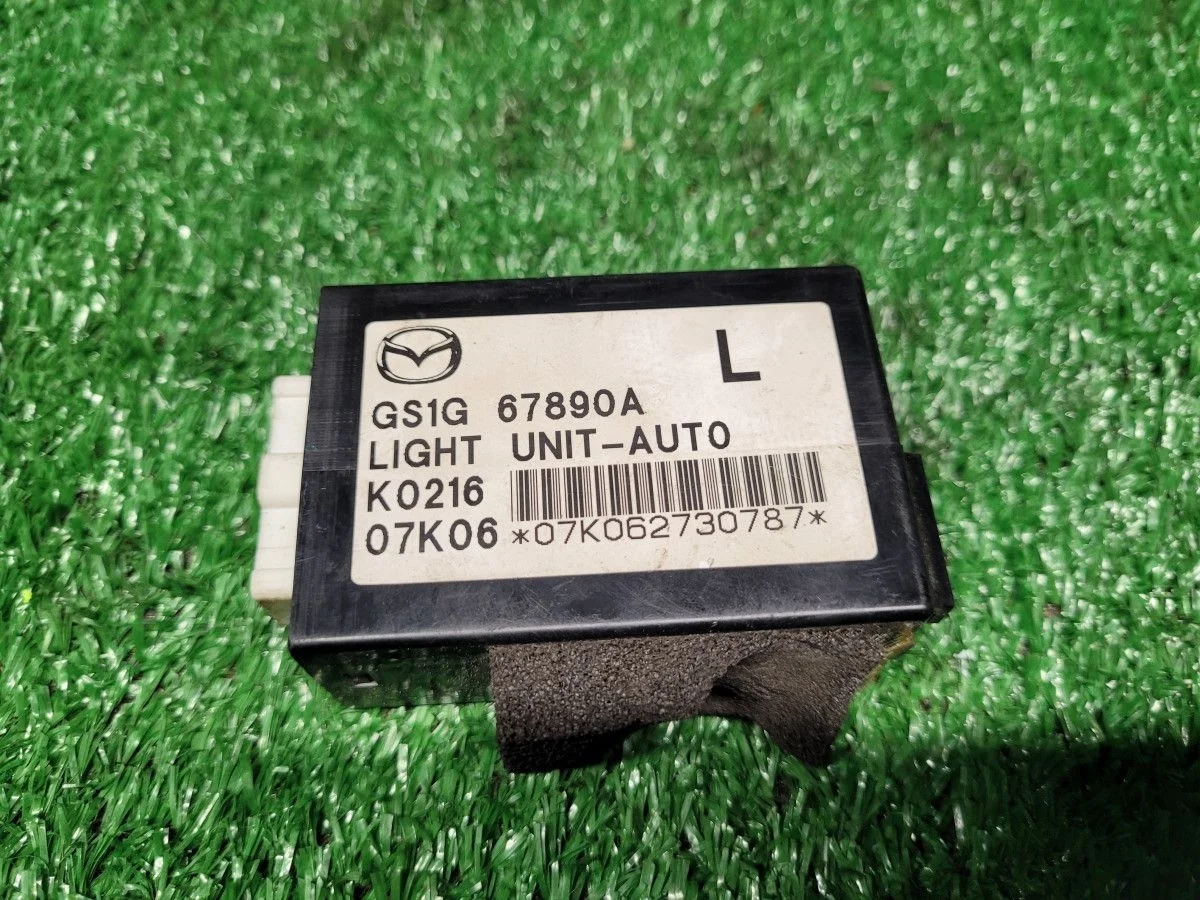 Блок управления освещением Mazda 6