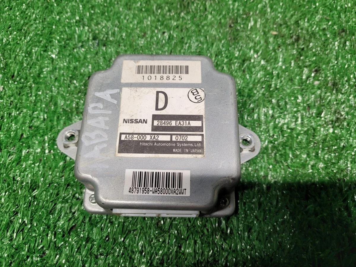 Блок управления раздаткой Nissan Navara D40