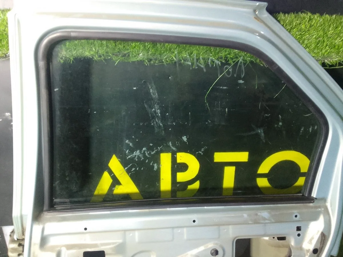 Стекло двери задней правой Renault Logan