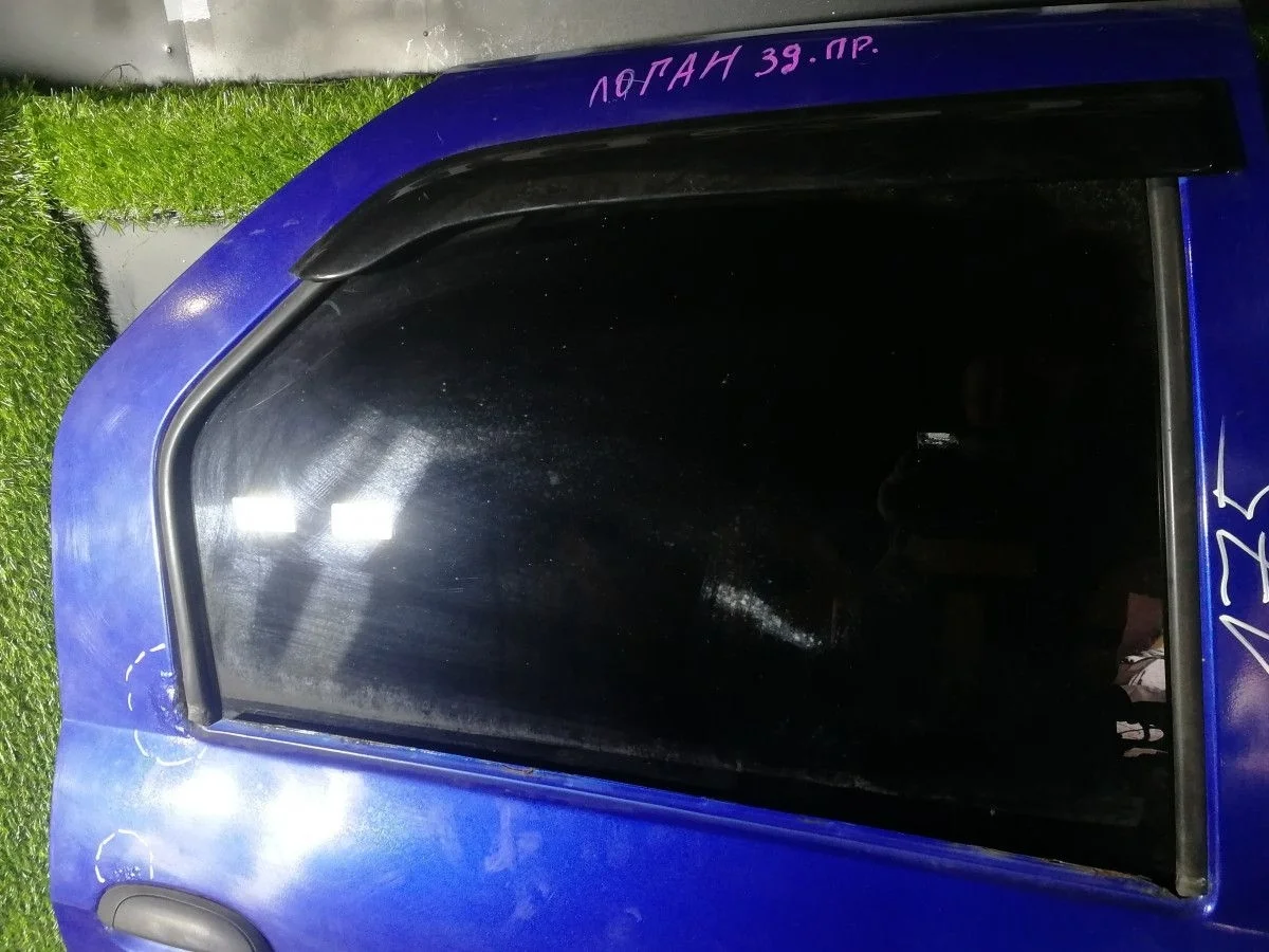 Стекло двери задней правой Renault Logan