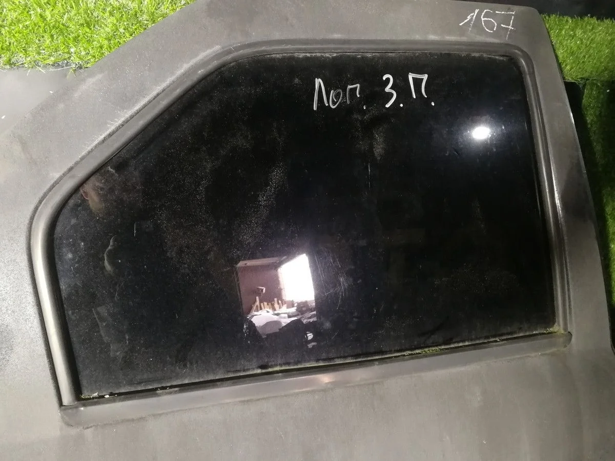 Стекло двери задней правой Renault Logan