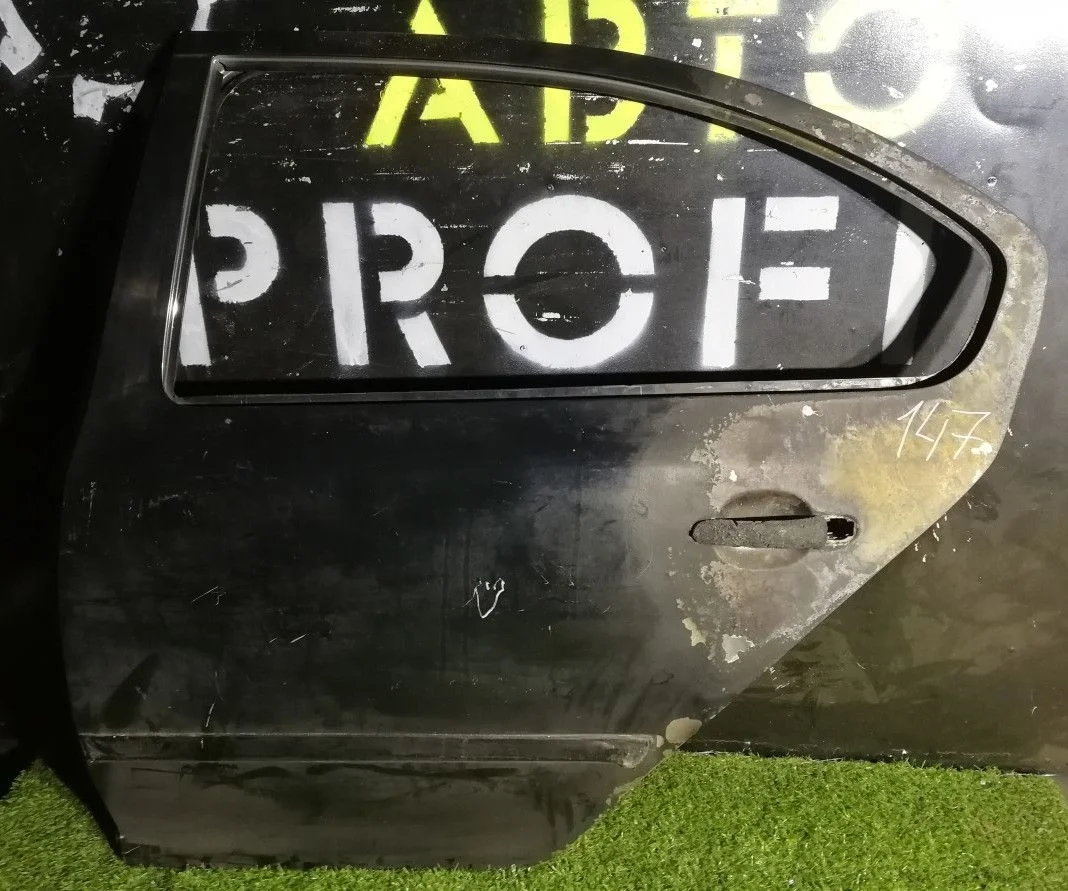 Дверь задняя левая Skoda Octavia A5 голое железо