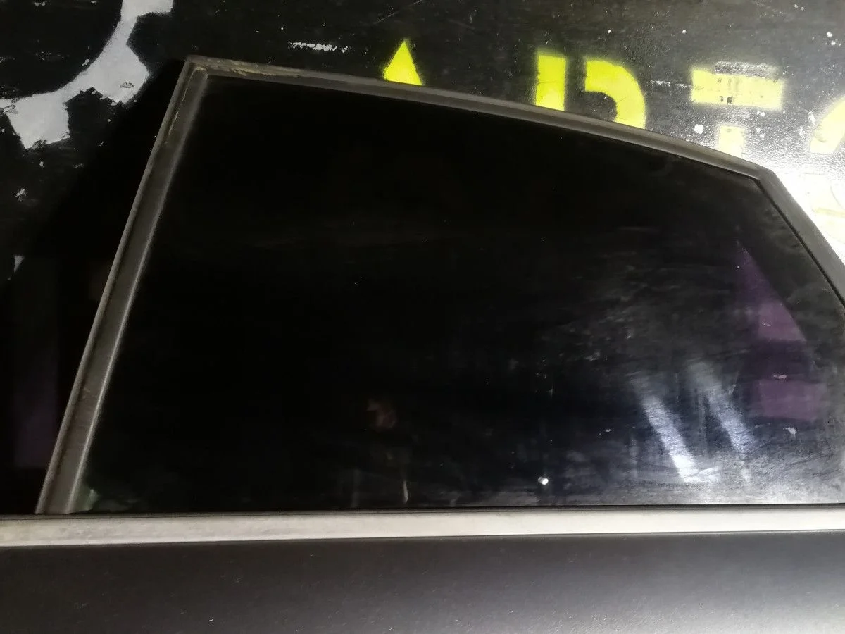 Стекло двери задней левой Audi A4 B7