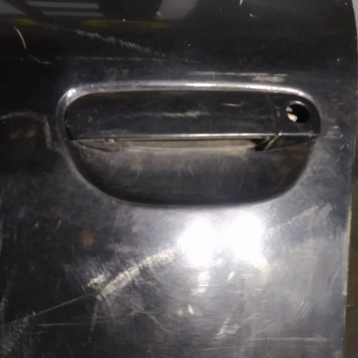 Ручка двери передней наружная левая