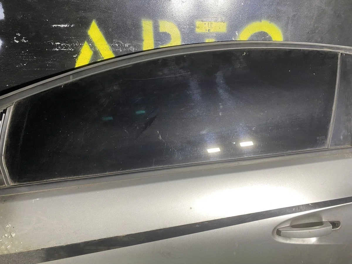 Стекло двери передней левой Opel Astra J