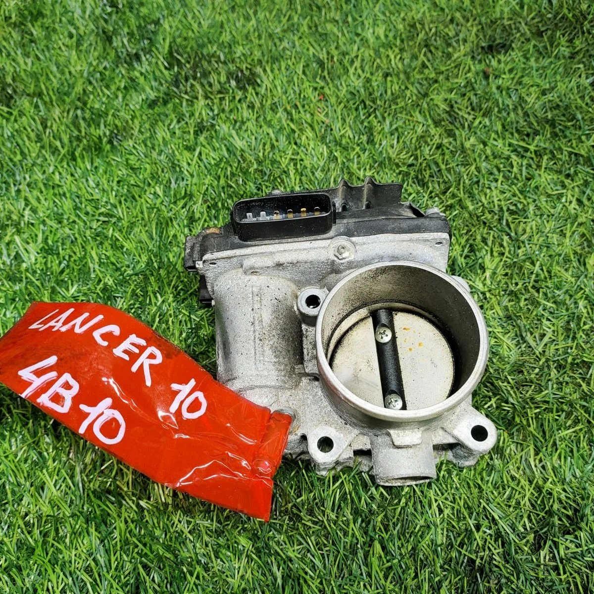 Дроссельная заслонка Mitsubishi Lancer X