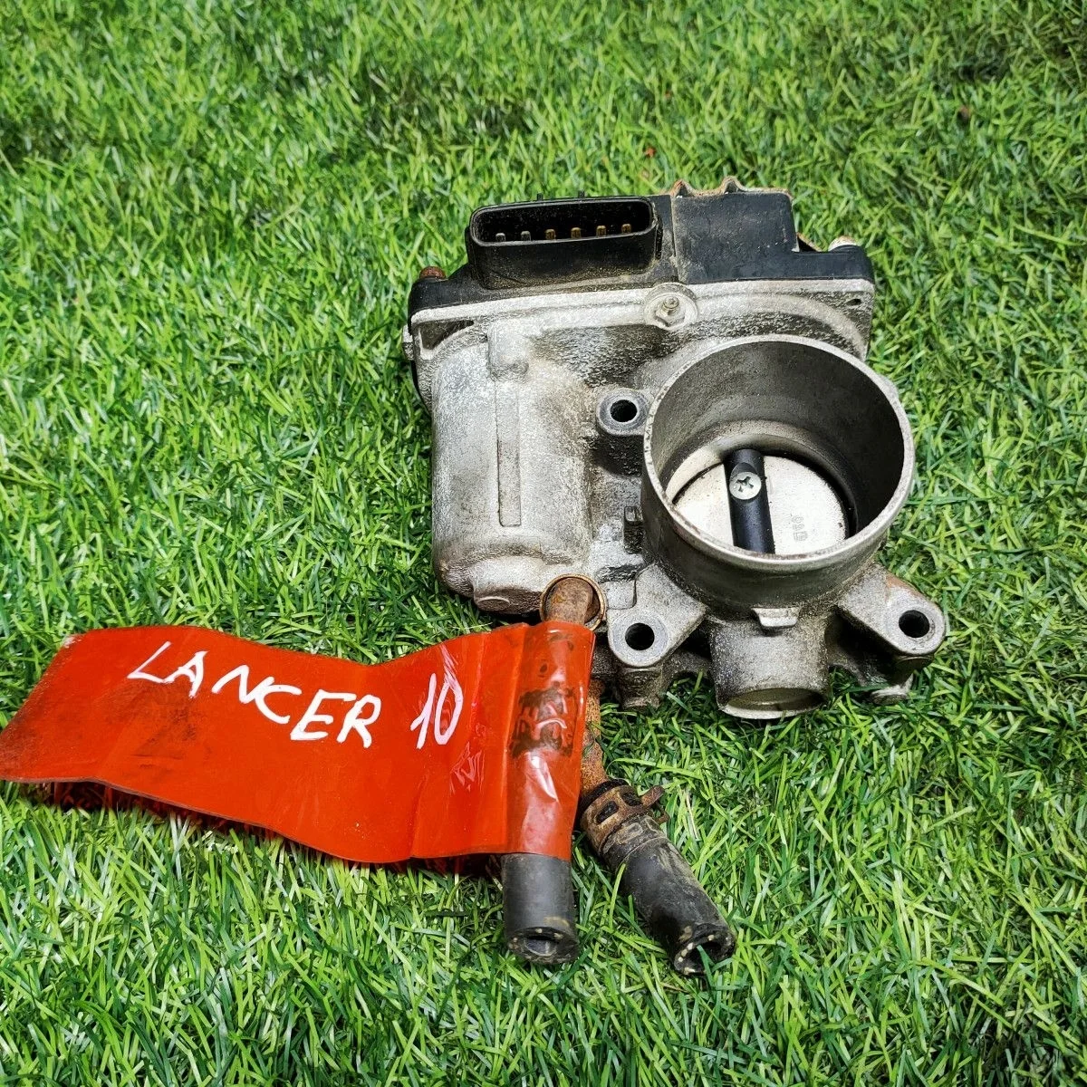 Дроссельная заслонка Mitsubishi Lancer X