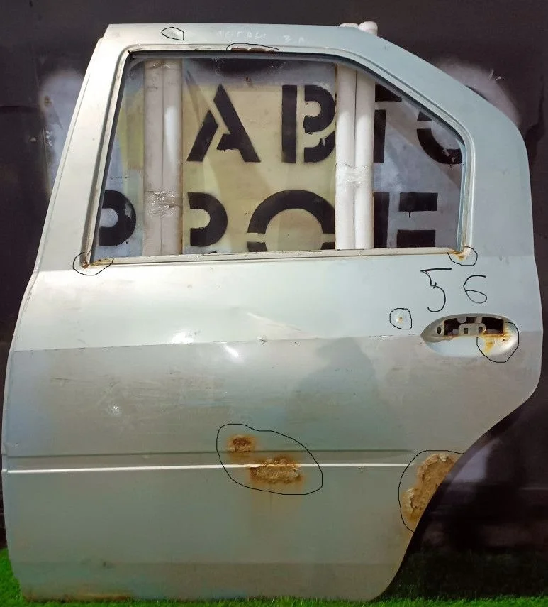 Дверь задняя левая Renault Logan