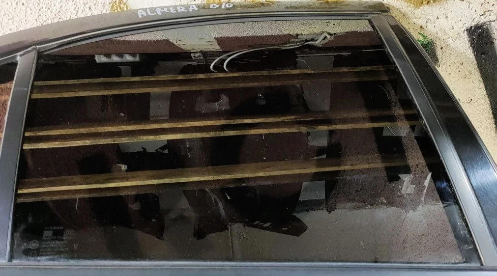 Стекло двери задней правой Nissan Almera Classic